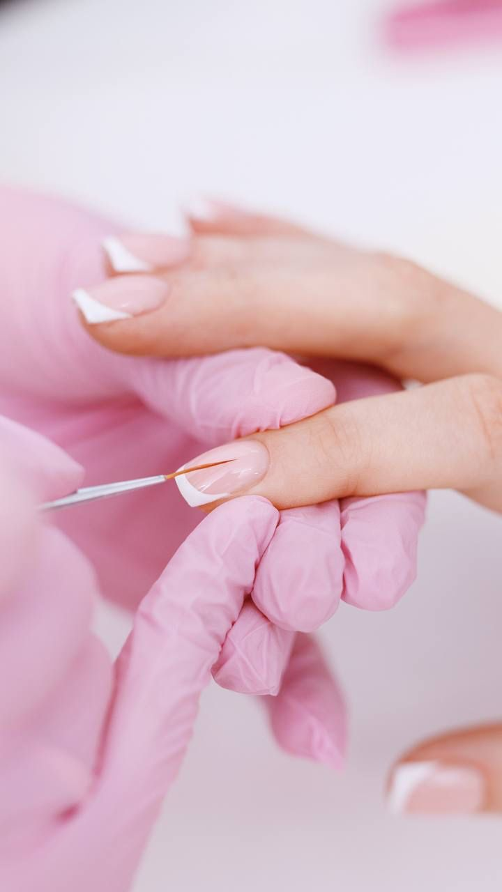 Nail technician working
